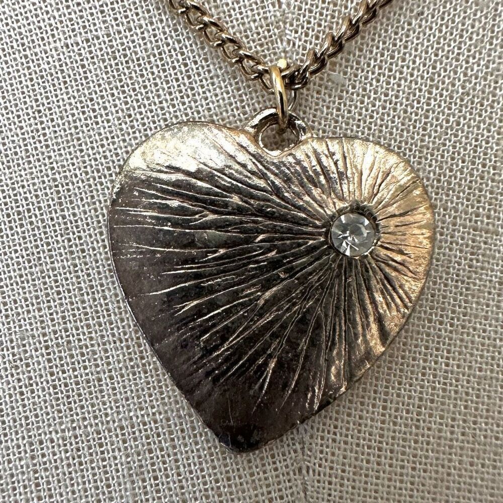 Gold tone heart pendant necklace